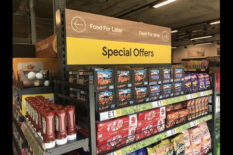 Signage upon entering the store directs customers either left or right, based on their shopping mission.